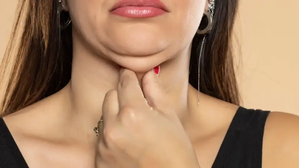 An image of a woman with double chin, sad, worried : Non Surgical Double Chin Removal Treatment in Iver, UK